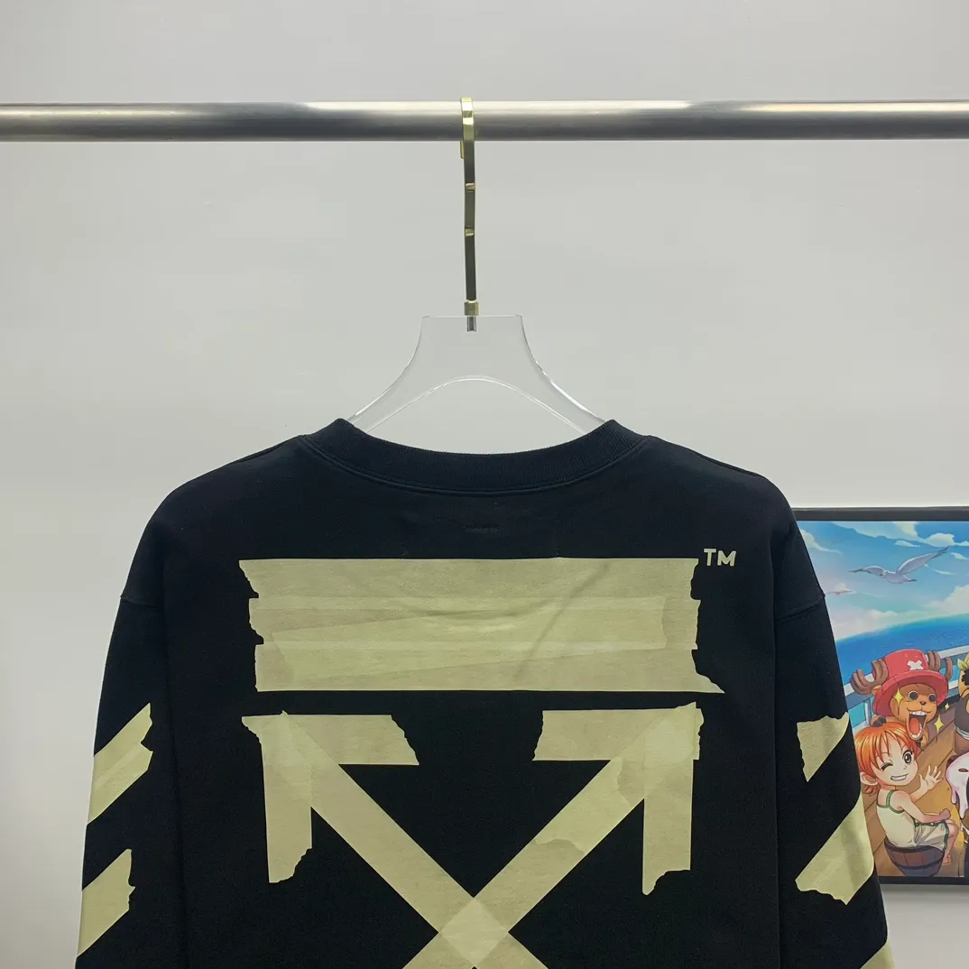 Top tested version OFF WHITE OW hot stamping strip printing male and female couple pure cotton loose same style pullover hooded sweatshirt The printing is done on a Japanese-owned Mimaki printing machine, with no edges or burrs. Inkjet heat transfer is hot-pressed and cold-teared, and the high temperature is 180 degrees. The front piece needs to be pressed twice (the second time requires 180kg of air pressure). The transparent fabric is anti-scratch and ironing, and the printing is fog-free. The semi-transparent tape in the front circle can reveal the part of the printing underneath. The golden printing color of the tape is not The flat color and tape printing overlap have different color depths. The wash label is also customized according to the original font. The accessories still use the full line of correct accessories. The rectangular woven collar label design is cancelled. The previous three-dimensional silicone feel font is changed to a fully woven collar label. Fluorescent fonts can be seen on the collar label. The five-link silicone hangtag, three-link washable label and zebra crossing packaging line are still the same. 480g pure cotton terry fabric, a major launch with full drape. A full set of customized accessories, one-to-one mold opening, professional ow. Size: XS-L Size chart